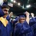 Graduates moves their tassel symbolizing graduation. Courtney Sacco I AnnArbor.com